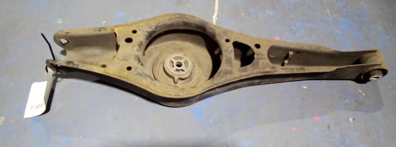2009 Volkswagen Golf Left Rear Trailing Arm View Auto part Left Rear Trailing Arm Volkswagen Golf 2009